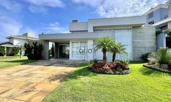 Imagem 2: Casa com piscina no Condominio Riviera com 4 suítes em Xangri-La. REF: CA0147