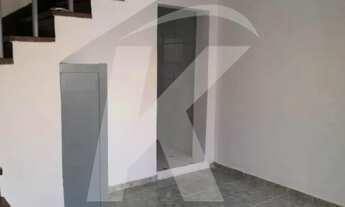 Imagem 6: Sobrado com 2 quartos, sala, cozinha, banheiro, área de serviço e garagem