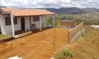 Imagem 2: Terreno com uma casa e galpão