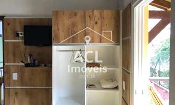 Imagem 2: Casa em condomínio com piscina, a poucos metros da praia em Camburi