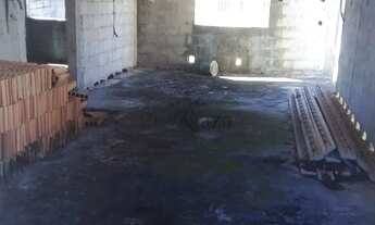 Imagem 6: Terreno de 512m² fechado de muro com casa em construção