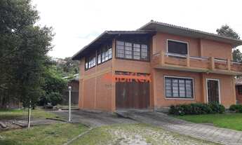 Imagem: Terreno a venda com 1 casa de 2 pisos e