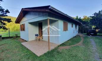 Imagem 4: Casa em madeira no final de rua, localizada em Picada Café-RS