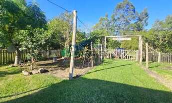 Imagem 2: Velleda oferece magnífico sítio de 4500m² com casa, açude, galpão amplo em Águas Claras