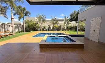 Imagem 3: Casa com 4 dormitórios à venda, 551 m² por R$ 5.200.000 - Condomínio Figueira Garden - Ati