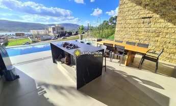 Imagem 5: Casa de condomínio para aluguel e venda possui 578 metros quadrados com 5 quartos