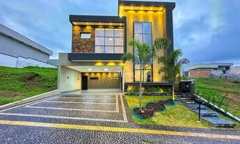 Imagem: Casa subtérrea com 4 suítes plenas sendo