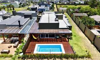 Imagem 5: Casa mobiliada com piscina e 4 suítes à venda - Condomínio Riviera - Xangri-Lá/RS REF