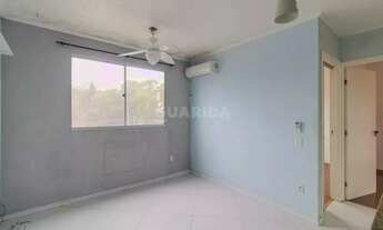 Imagem 2: Apartamento com 2 dormitórios e 1 vaga de garagem no Bairro Cavalhada