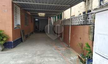 Imagem: Terreno amplo com casas, kitnets e quartos