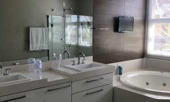 Imagem 6: Casa de condomínio para venda possui 540 metros quadrados com 4 quartos