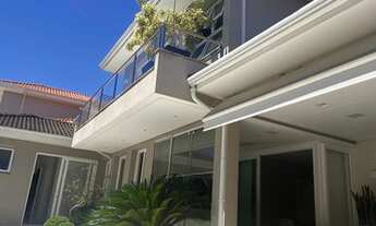 Imagem 3: Casa de condomínio para venda possui 540 metros quadrados com 4 quartos