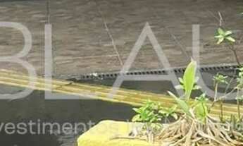 Imagem 2: Esquina com 2 casas e um ponto Comercial