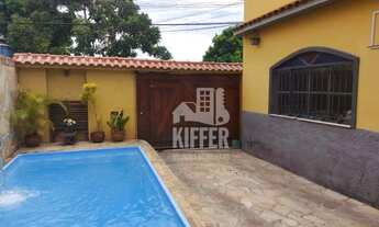 Imagem: Casa com 6 dormitórios à venda, 134 m²