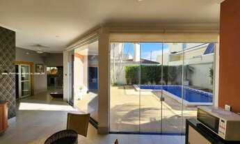 Imagem 2: Esta casa de alto padrão no Condomínio Damha 1 é uma verdadeira obra-prima. Com uma área t