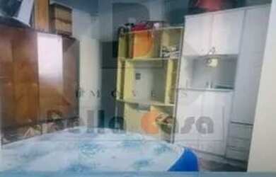 Imagem 4: Terreno contendo 1 casa pequena com 2 dormitórios. cozinha, banheiro e sala. Rua particula