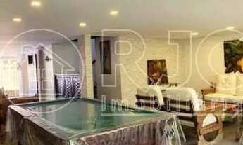 Imagem 3: Casa de condomínio para venda possui 310 metros quadrados com 3 quartos