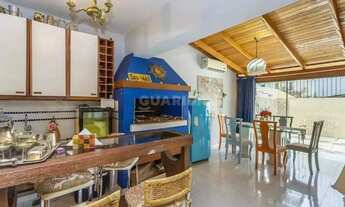 Imagem 3: Casa em Condomínio com 4 dormitórios, sendo 1 suíte, e 2 vagas de garagem no bairro Jardim