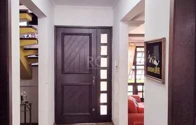 Imagem 6: CASA 04 DORMITÓRIOS 02 VAGAS NO BAIRRO CAMAQUÃ