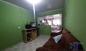 Imagem 7: LOTE COM CASA BORDA DO CAMPO