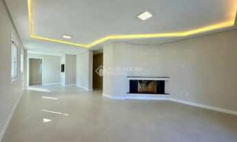 Imagem 3: CASA TÉRREA NO CENTRO DE XANGRI-LÁ, FRENTE LESTE, DIVISA COM ATLÂNTIDA