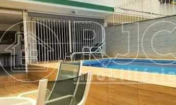 Imagem 6: Casa de condomínio para venda possui 310 metros quadrados com 3 quartos