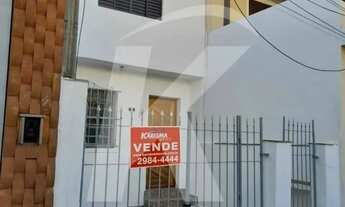 Imagem 2: Sobrado com 2 quartos, sala, cozinha, banheiro, área de serviço e garagem