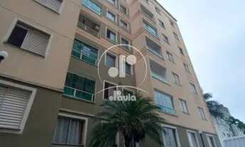 Imagem 7: Imóvel com cozinha arejado e com móveis planejados, suíte com box e gabinete, sala com pap