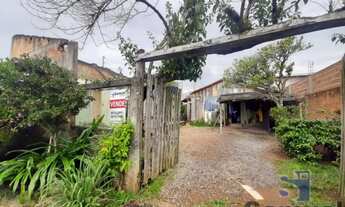 Imagem: LOTE COM CASA BORDA DO CAMPO