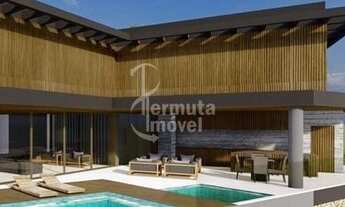 Imagem 2: Casa à venda com 597m²,4 suítes,sala de estar,sauna,piscina e garagem para 8 carros no Tam