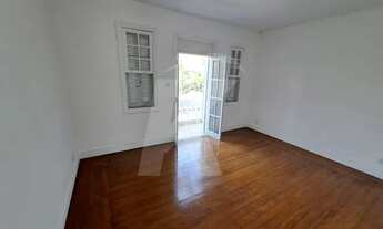 Imagem 2: Casa com 3 quartos, sala, cozinha, banheiro, área de serviço, quintal e garagem para 5 car