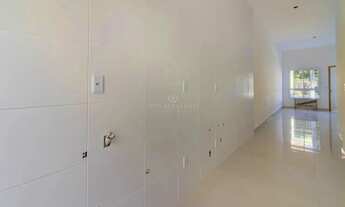 Imagem 2: Casa Térrea à venda no bairro Guarujá, Zona Sul de Porto Alegre. Com 3 dormitório(s), 1 va