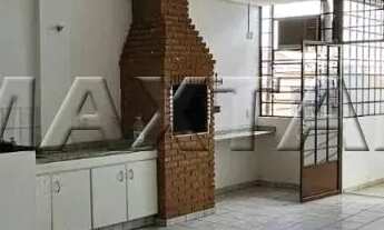 Imagem 2: Prédio comercial em Santana com três andares, várias salas e área de lazer com churrasquei