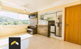 Imagem 2: Apartamento com 2 dormitórios para alugar, 80 m² por R$ 1.800,00/mês - Partenon - Porto Al