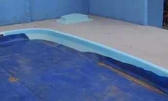 Imagem 2: Casa no Sarandi de 2 dormitórios e pátio com piscina