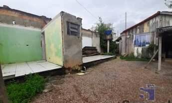 Imagem 2: LOTE COM CASA BORDA DO CAMPO