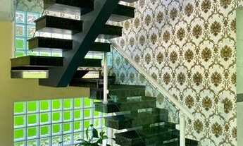 Imagem 6: Sobrado para venda possui 300 metros quadrados com 5 quartos em Real - Praia Grande - SP