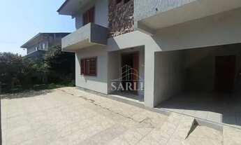 Imagem 3: Casa com 3 dormitórios à venda, 200 m² por R$ 850.000 - Barreiros - São José/SC