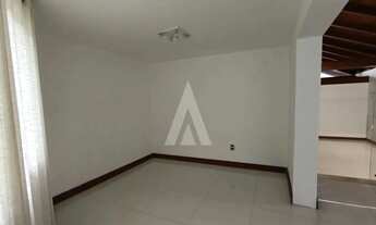 Imagem 4: Casa comercial localizada no bairro Atiradores, composta por 6 salas e vaga de garagem cob