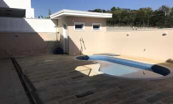 Imagem 6: Sobrado com 4 dormitorios sendo 4 suites , sala com pé direito duplo . piscina