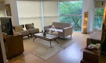 Imagem: Sala quarto com vaga, varanda, prédio com