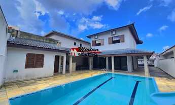 Imagem 1: Sobrado 4 dormitórios sendo 2 suites, com piscina 200 metros da praia com 415 m2 de terren