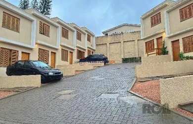 Imagem 2: Casa Condominio em Porto Alegre, no bairro Teresópolis, com 2 dormitório(s), e 2 banheiros