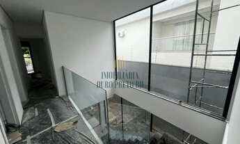 Imagem 4: Casa com 4 quartos, sendo 3 suítes, piscina e 2 vagas cobertas á venda no bairro Trevo