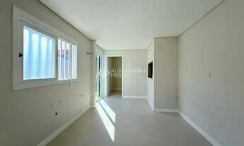 Imagem 6: CASA TÉRREA NO CENTRO DE XANGRI-LÁ, FRENTE LESTE, DIVISA COM ATLÂNTIDA