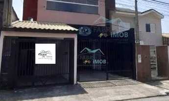 Imagem: Sobrado com galpão localizado em um terreno