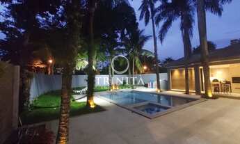 Imagem 2: Casa de condomínio para venda tem 605 metros quadrados com 5 quartos