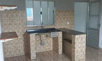 Imagem: Um cômodo grande com cozinha americana