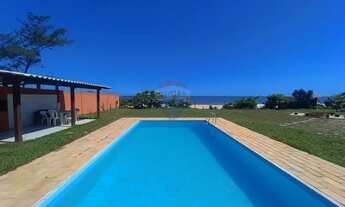 Imagem: Casa de praia, pé na areia, 3 quartos