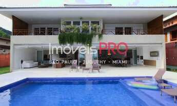 Imagem: CASA CINEMATOGRÁFICA PÉ NA AREIA PRAIA